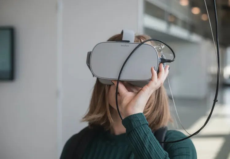 A women wearing a VR set